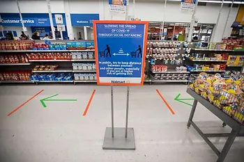 Walmart social distancing sign