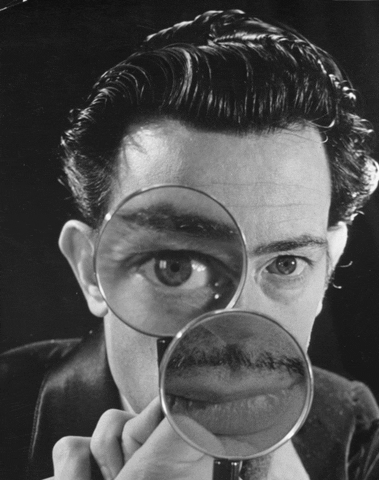 man with magnifying glass