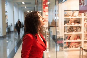 Woman looking at front store display