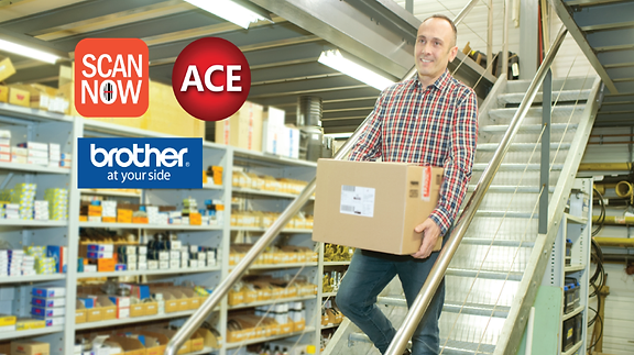 Man bringing a box downstairs into an inventory room