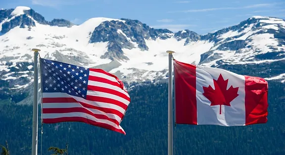 US flag next to a Canadian flag 
