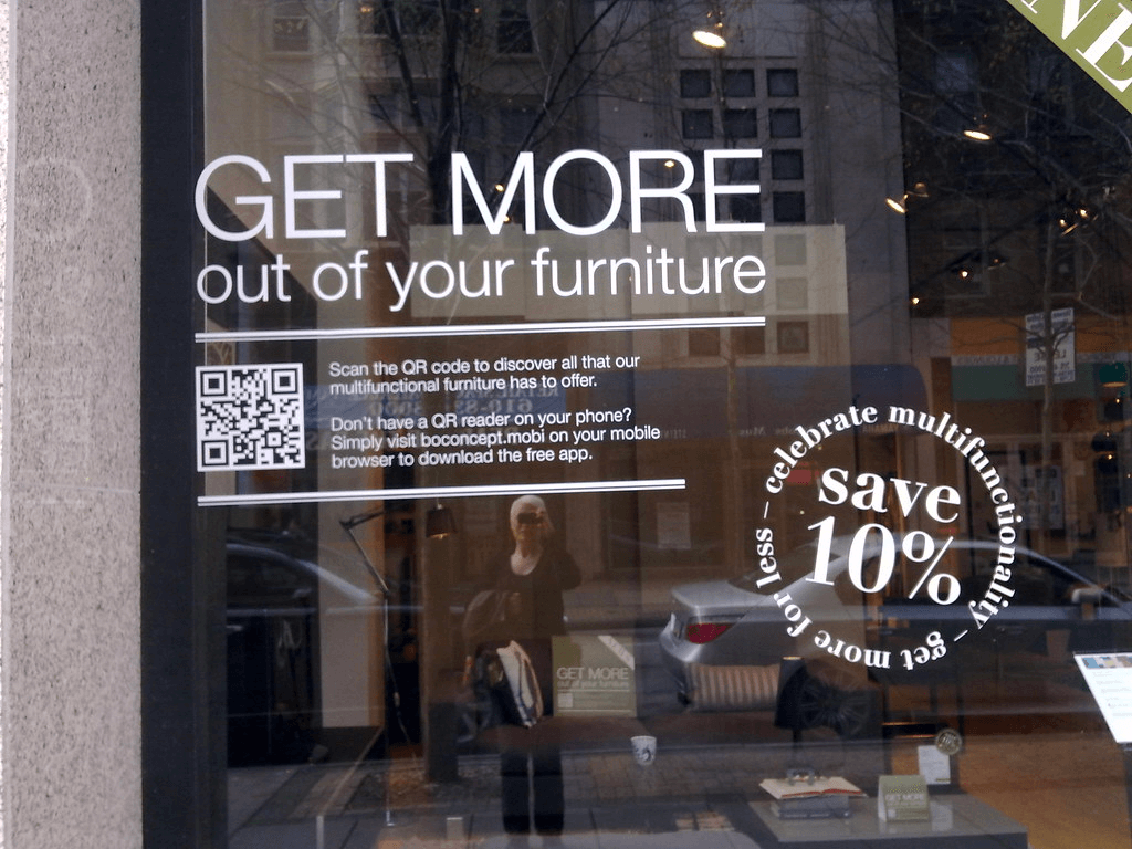 Furniture store with a QR code on the front window